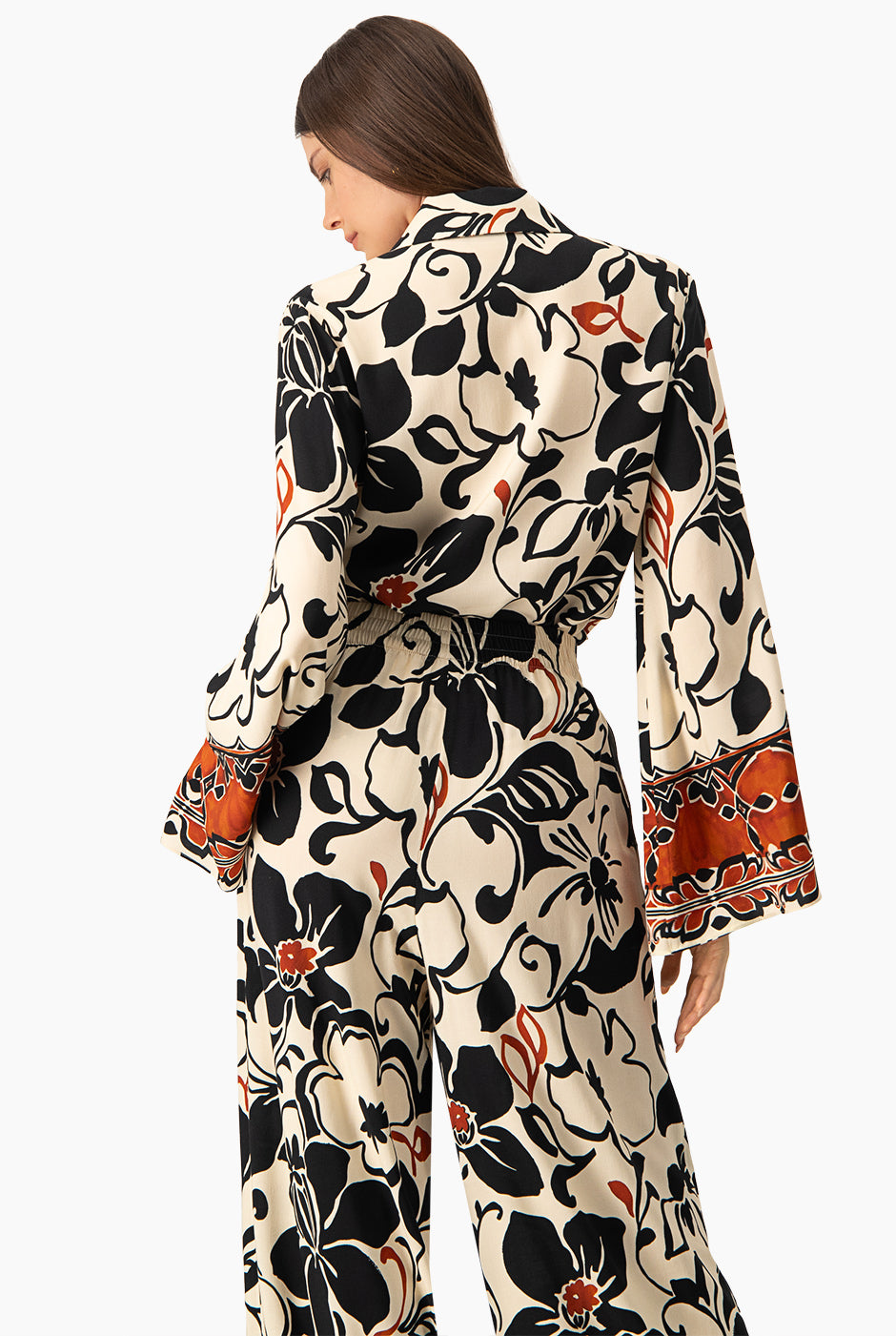 Blusa larga multicolor con cuello camisero y estampado floral