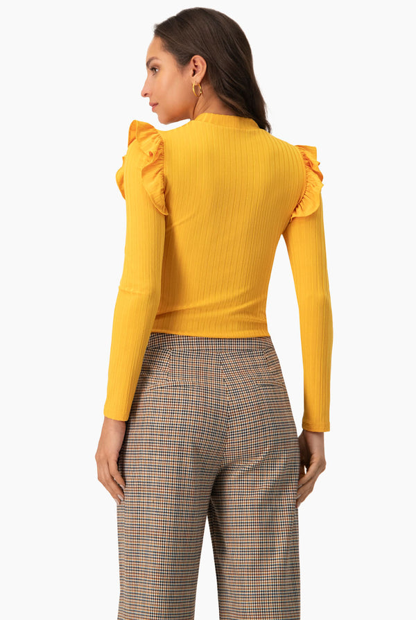 Blusa de manga larga volantes