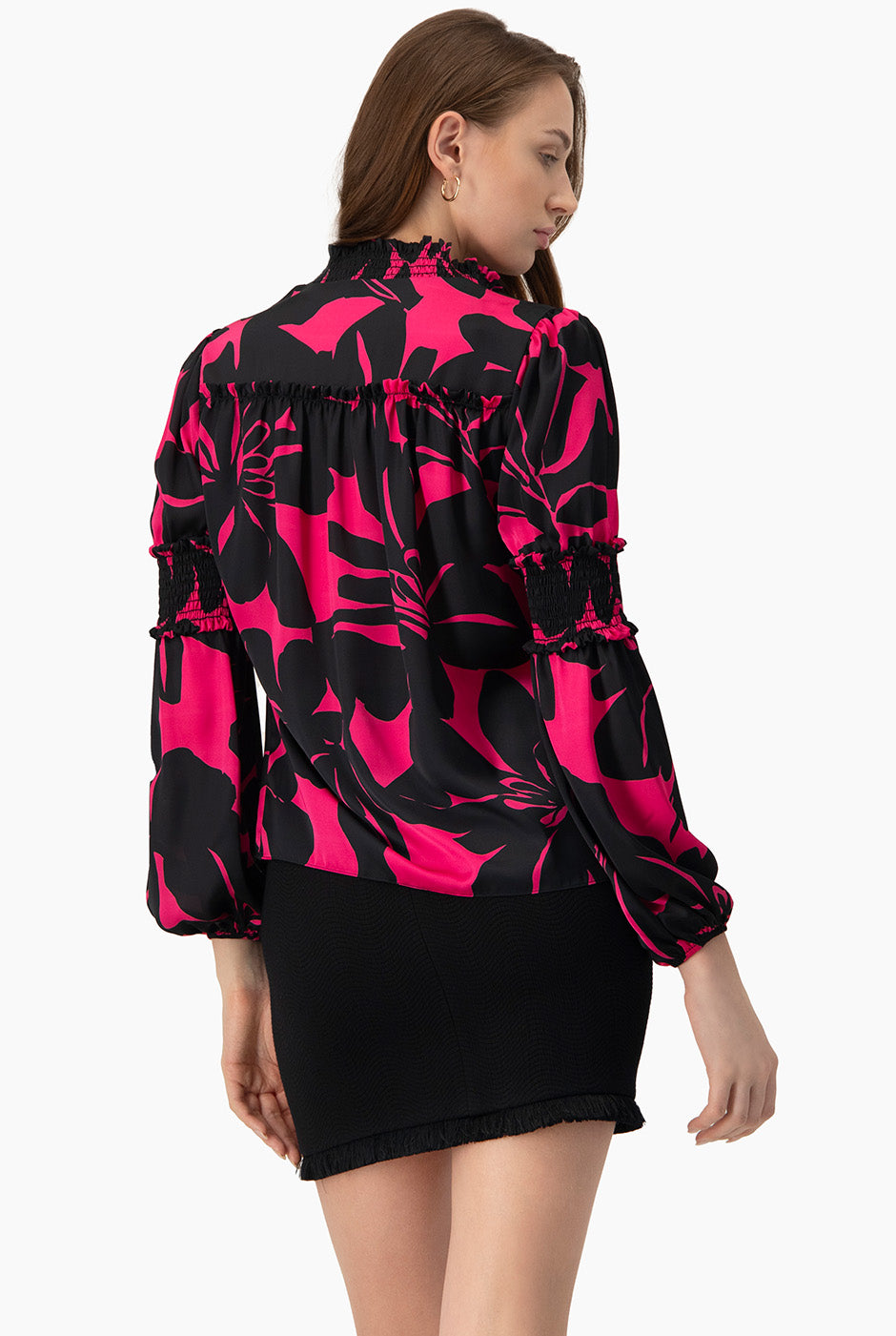 Blusa fucsia de manga larga con estampado floral y smock