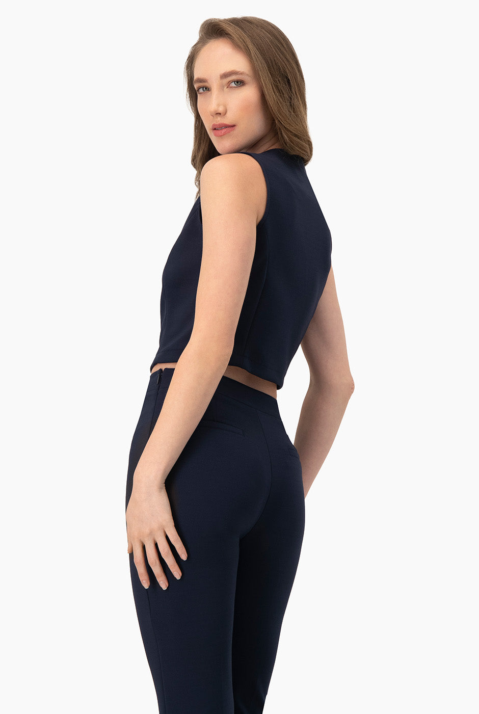 Top corto azul marino con cierre frontal y sin mangas