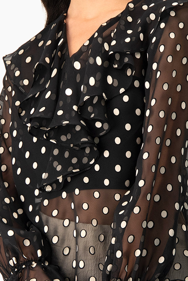 Blusa de lunares y escote en V