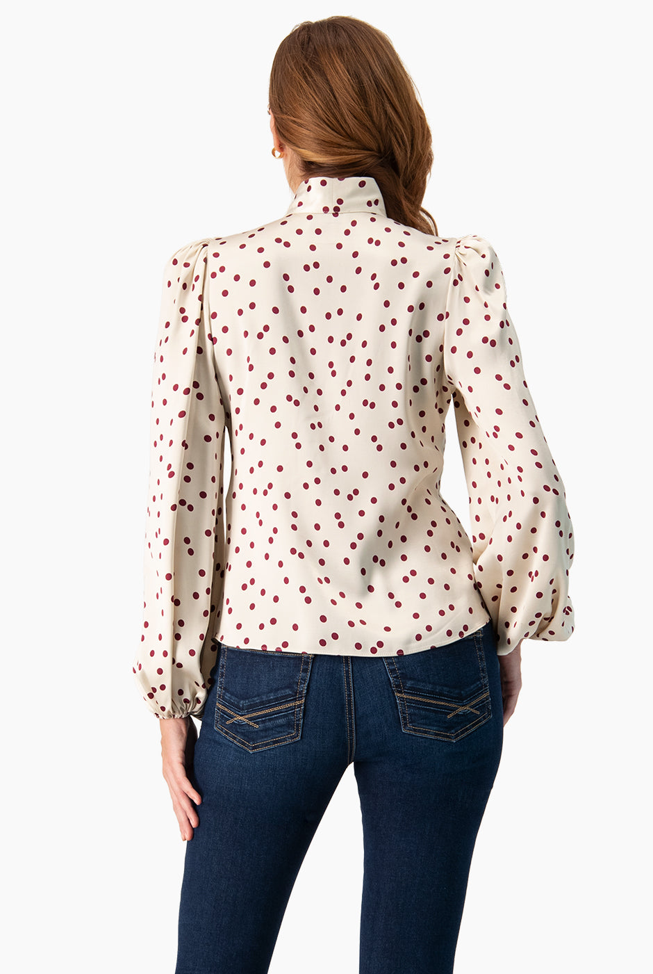 Blusa marfil con lunares y lazo en el cuello