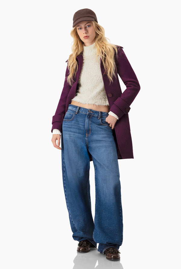 Blusa de flecos y manga larga