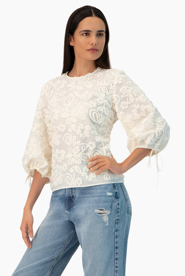 Blusa manga larga con amarre