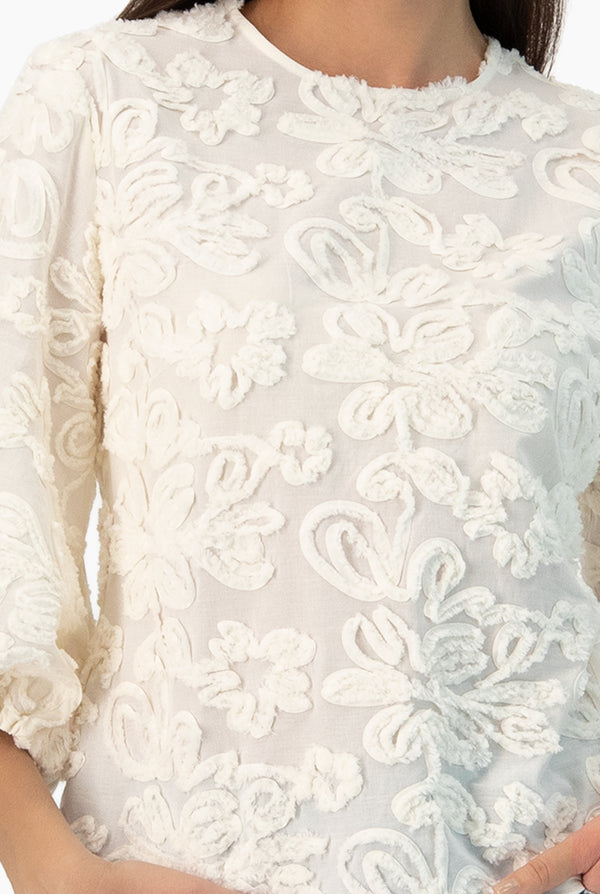 Blusa manga larga con amarre