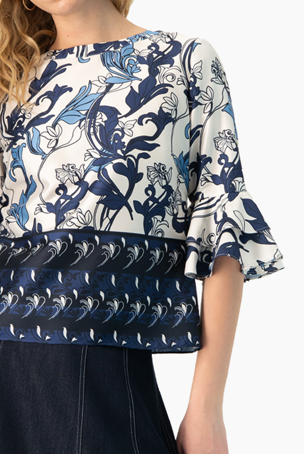 Blusa manga 3/4 con olanes