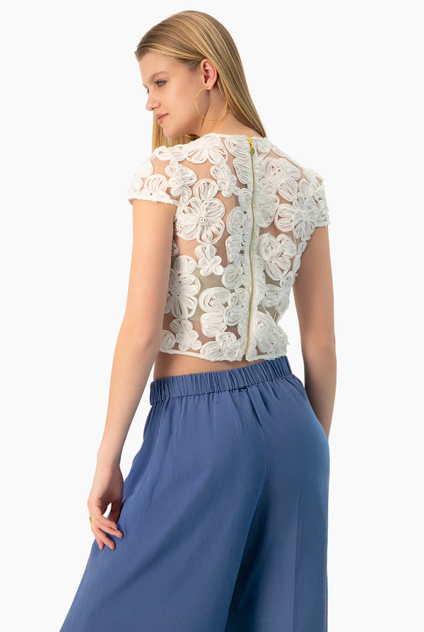 Blusa marfil de cuello redondo