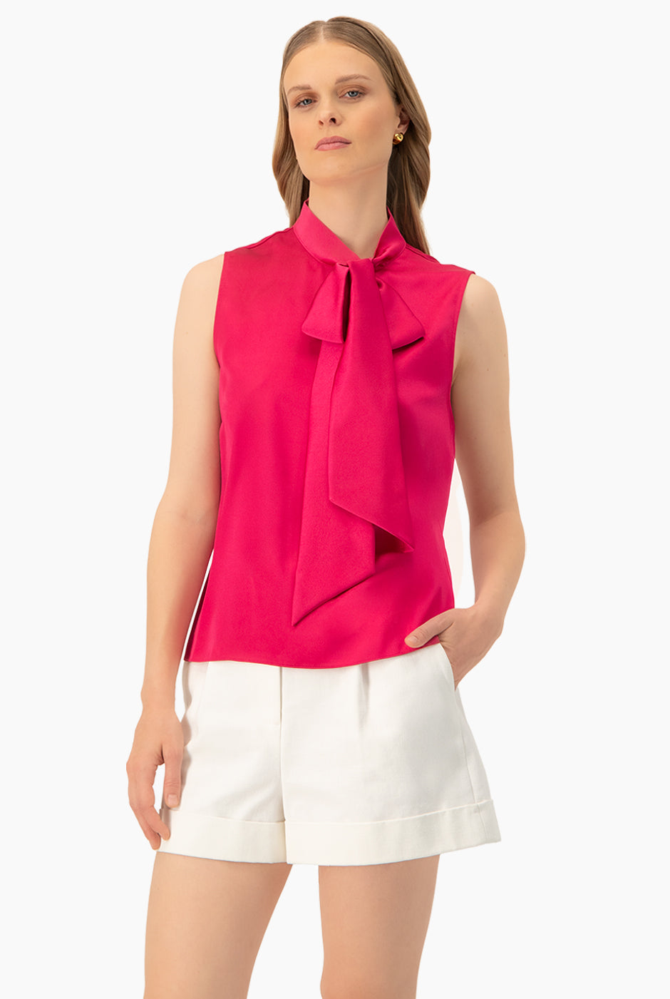 Blusa fucsia sin mangas con cuello lazo de Ivonne