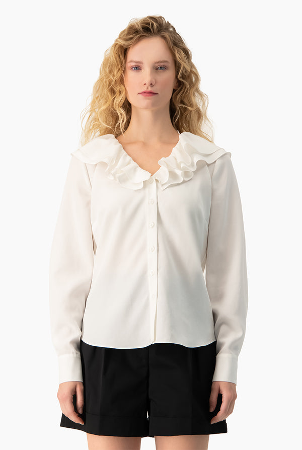 Blusa escote en V con volante