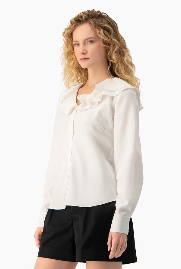 Blusa escote en V con volante