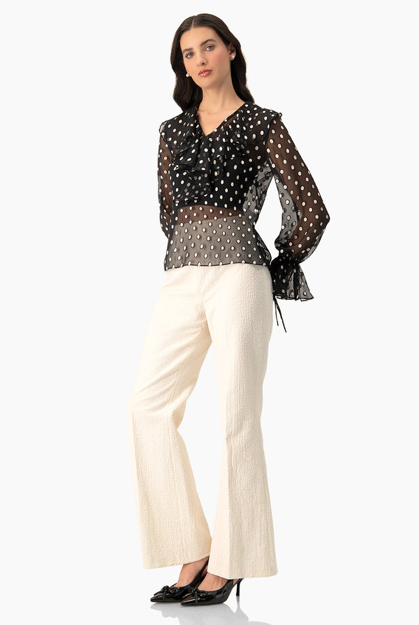 Pantalon amplio y cierre en costado