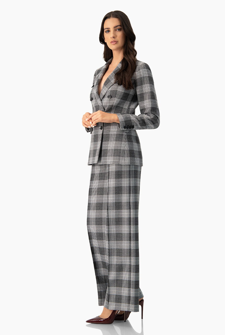 Pantalón recto negro con estampado de cuadros y bolsillos laterales