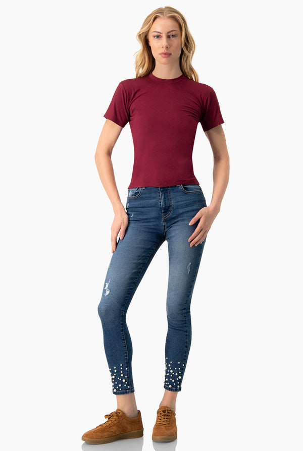 Jeans skinny con perlas