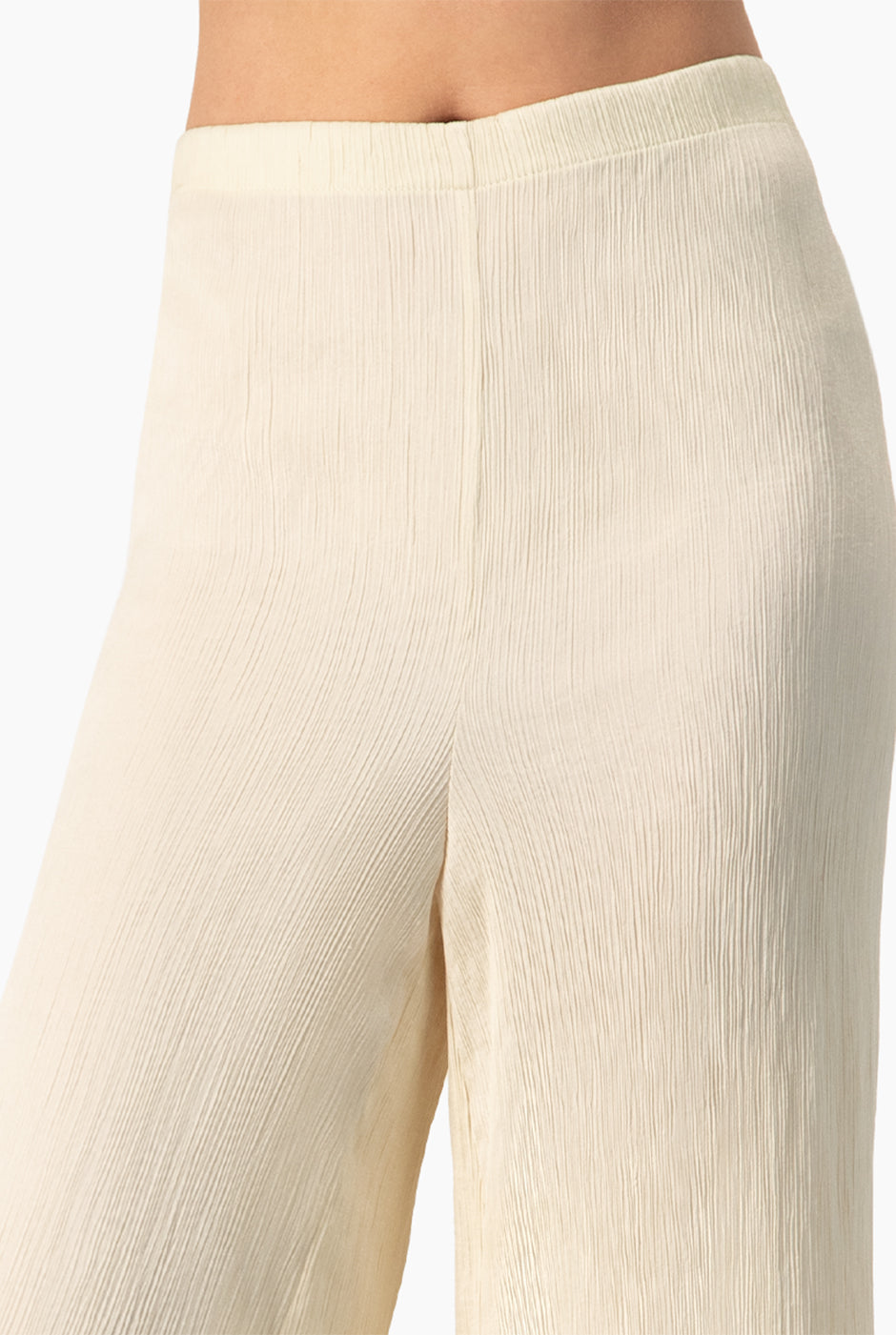 Pantalón amplio marfil plisado sin bolsillos