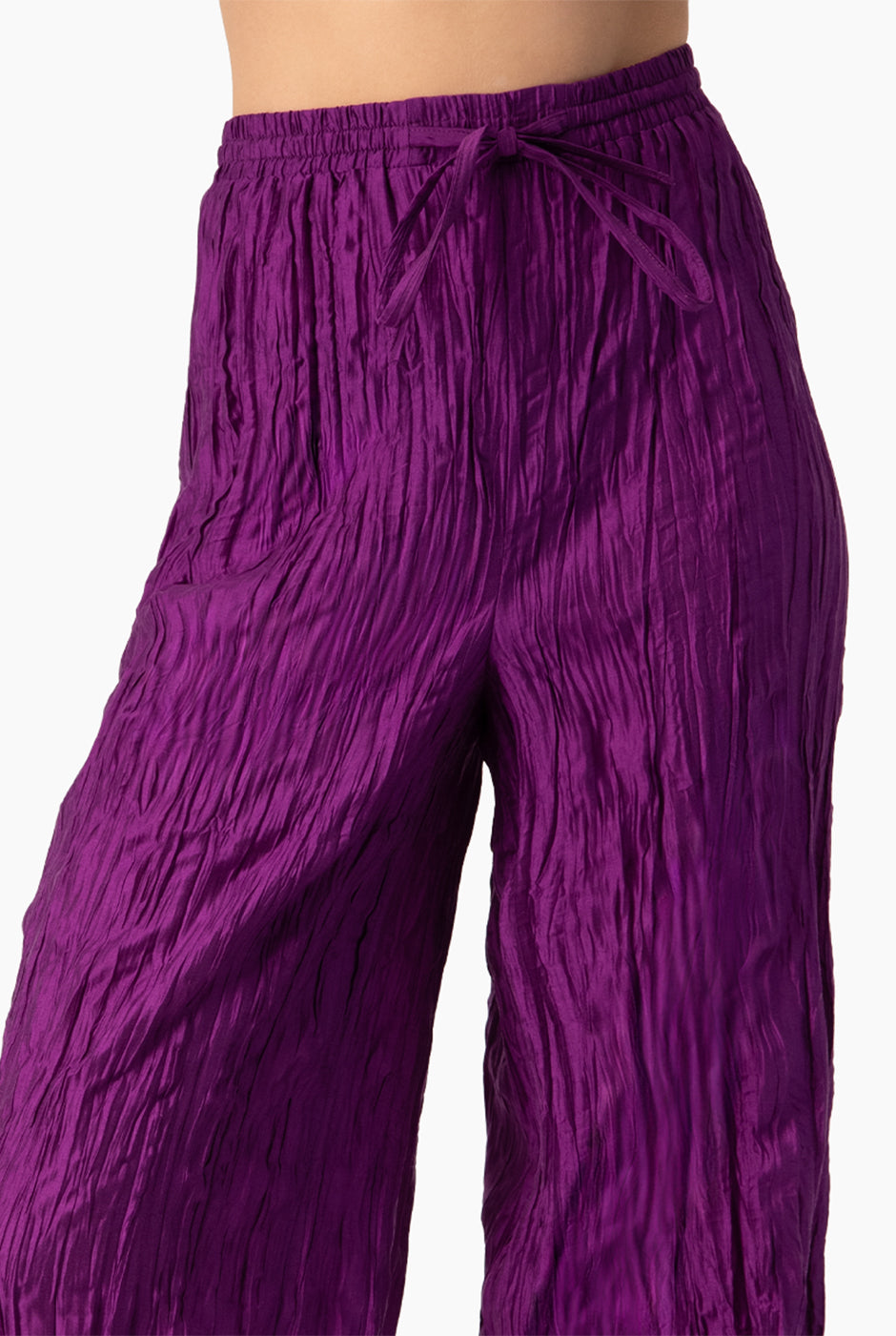 Pantalón morado amplio con cintas en tobillos y cintura