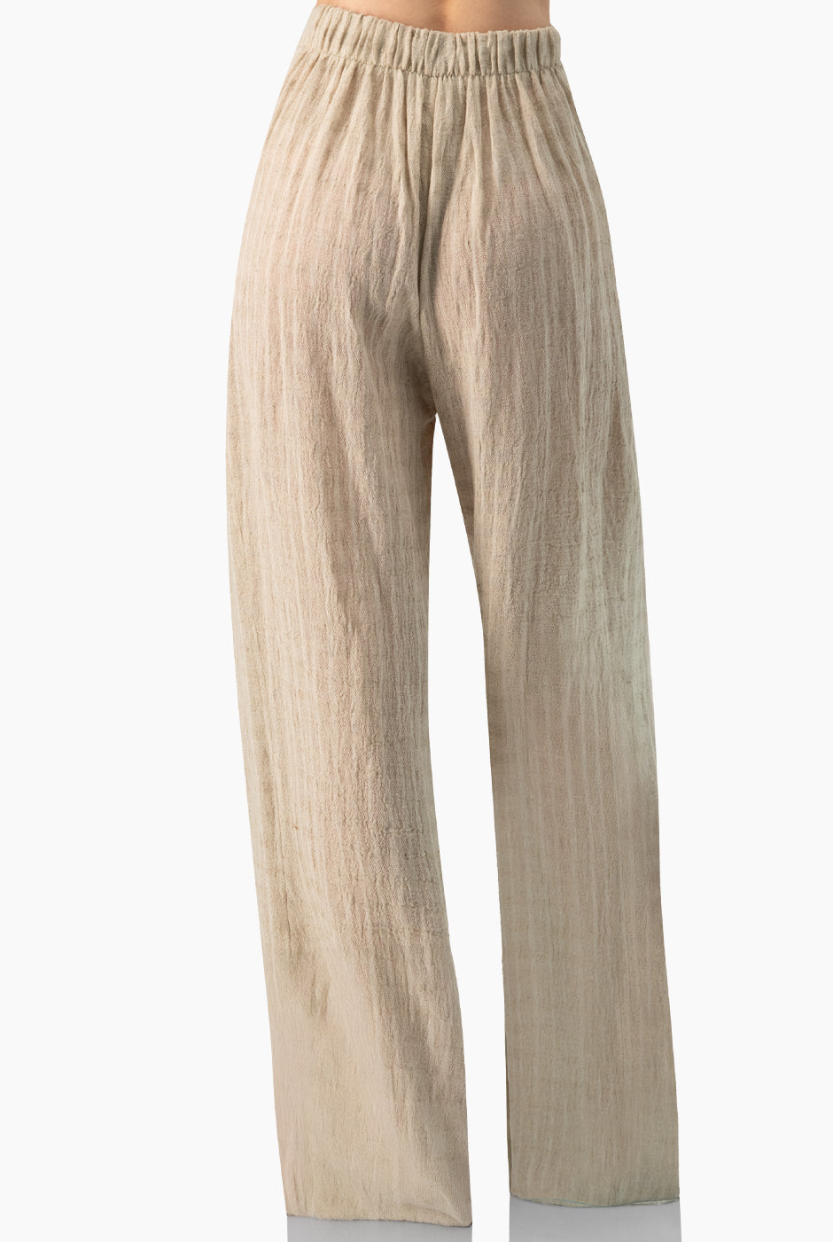 Pantalón recto marfil de pierna amplia sin bolsillos.