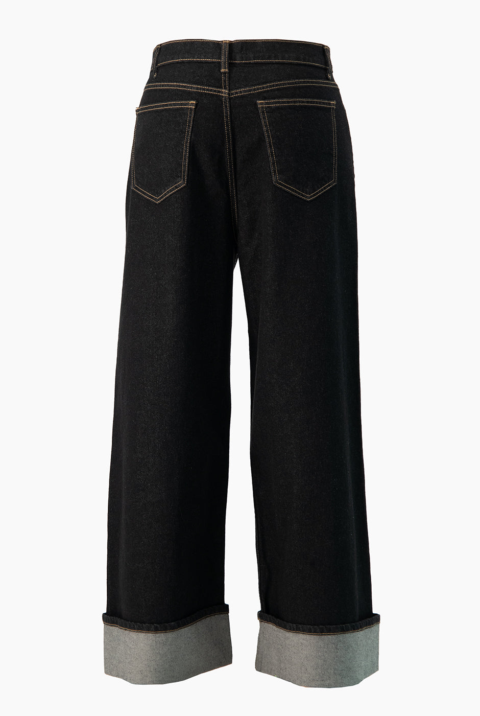 Jeans denim azul marino con dobladillo ancho y bolsillos de parche