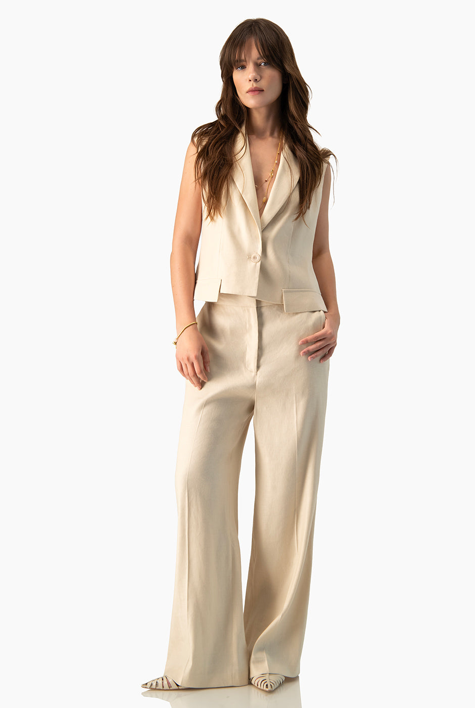 Pantalón Ivonne beige de pierna ancha con bolsillos laterales