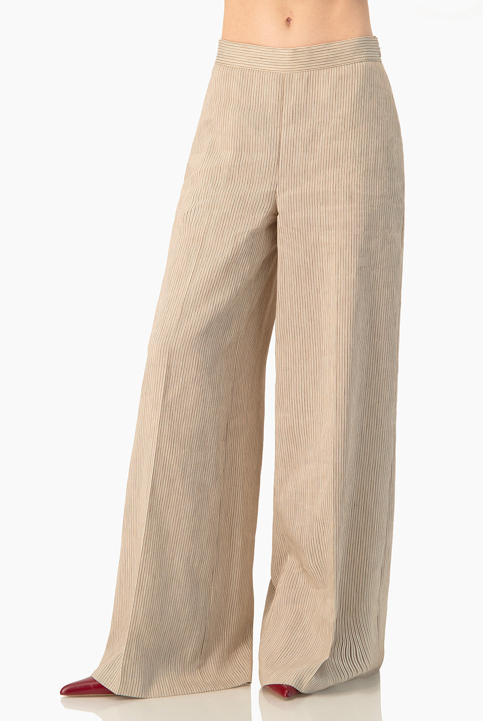 Pantalón Ivonne amplio rayado en beige con bolsillos laterales