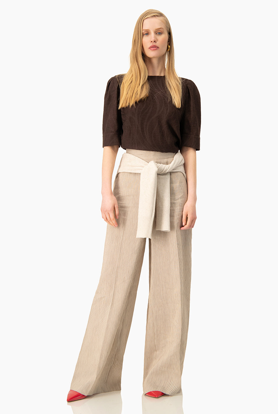 Pantalón Ivonne amplio rayado en beige con bolsillos laterales