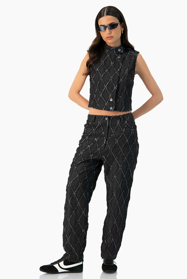 Chaleco denim con destruccion