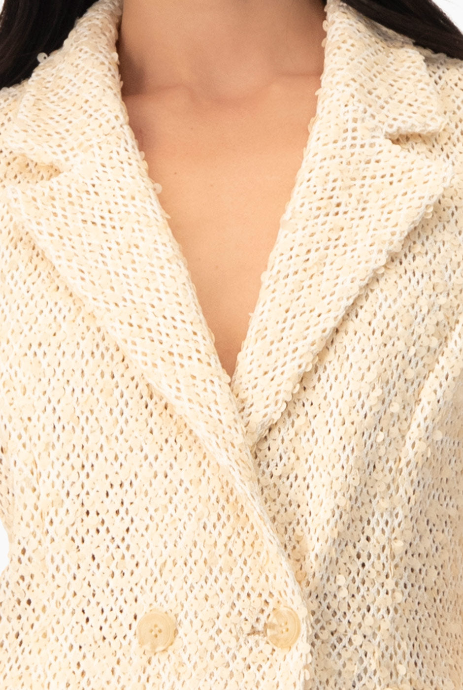 Saco tejido cruzado con doble botón y lentejuelas