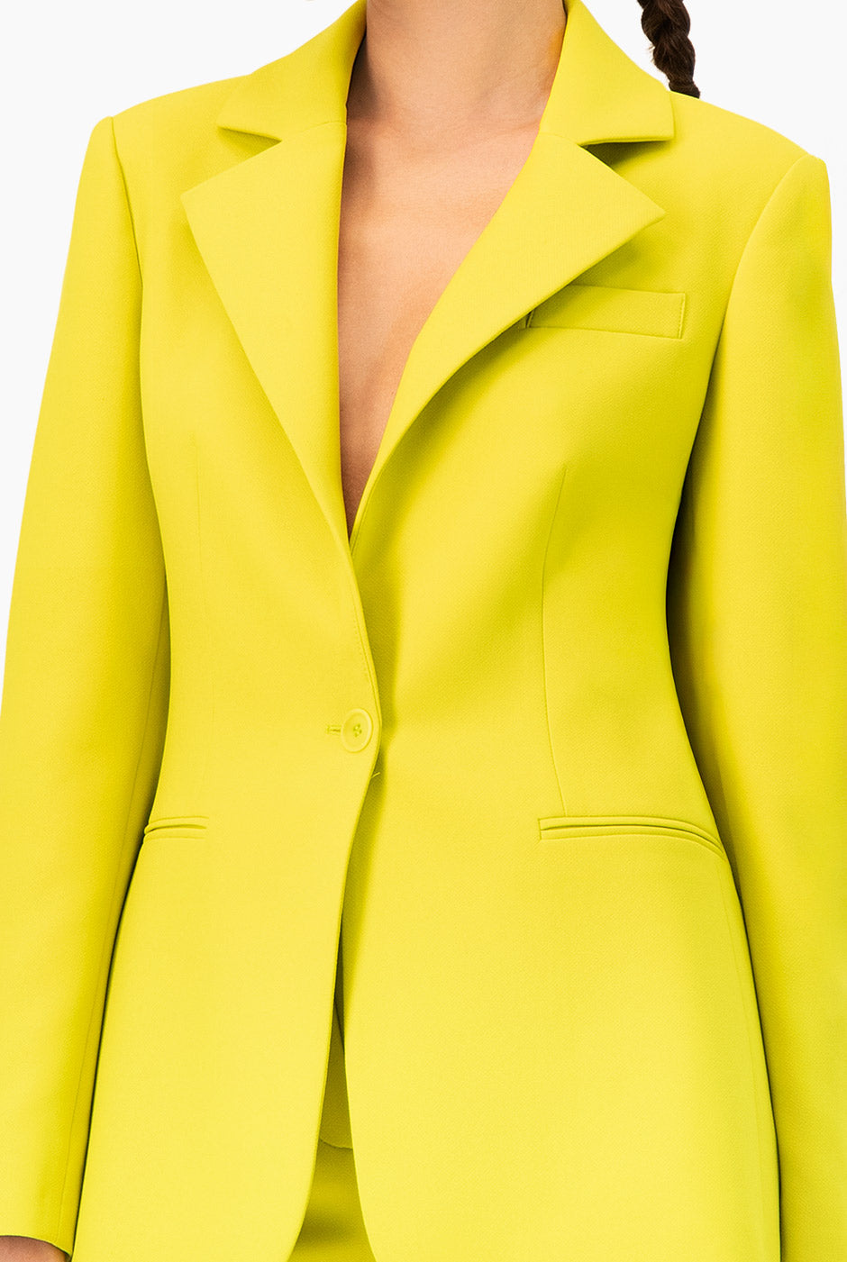 Saco sastreado verde con solapa y bolsillos