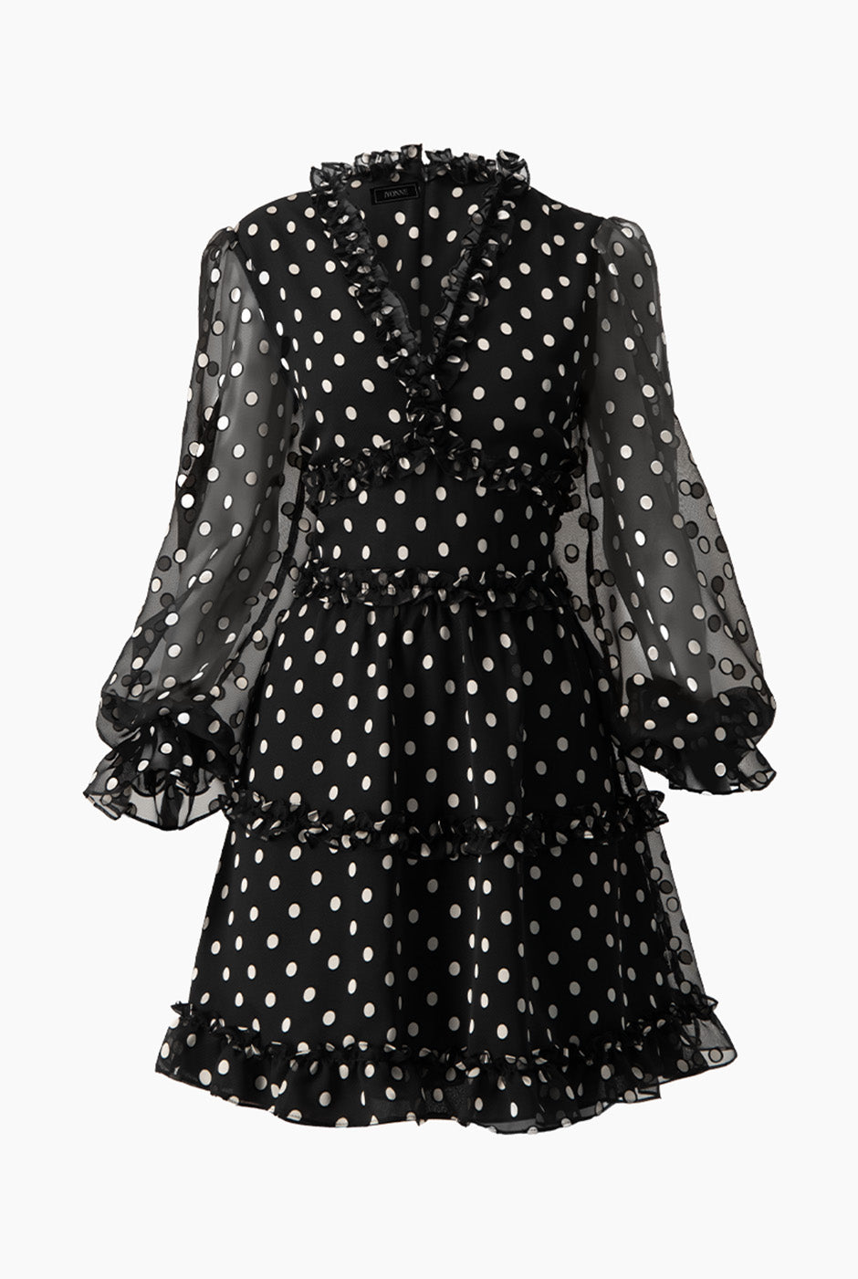 Vestido corto negro con estampado de lunares y manga larga