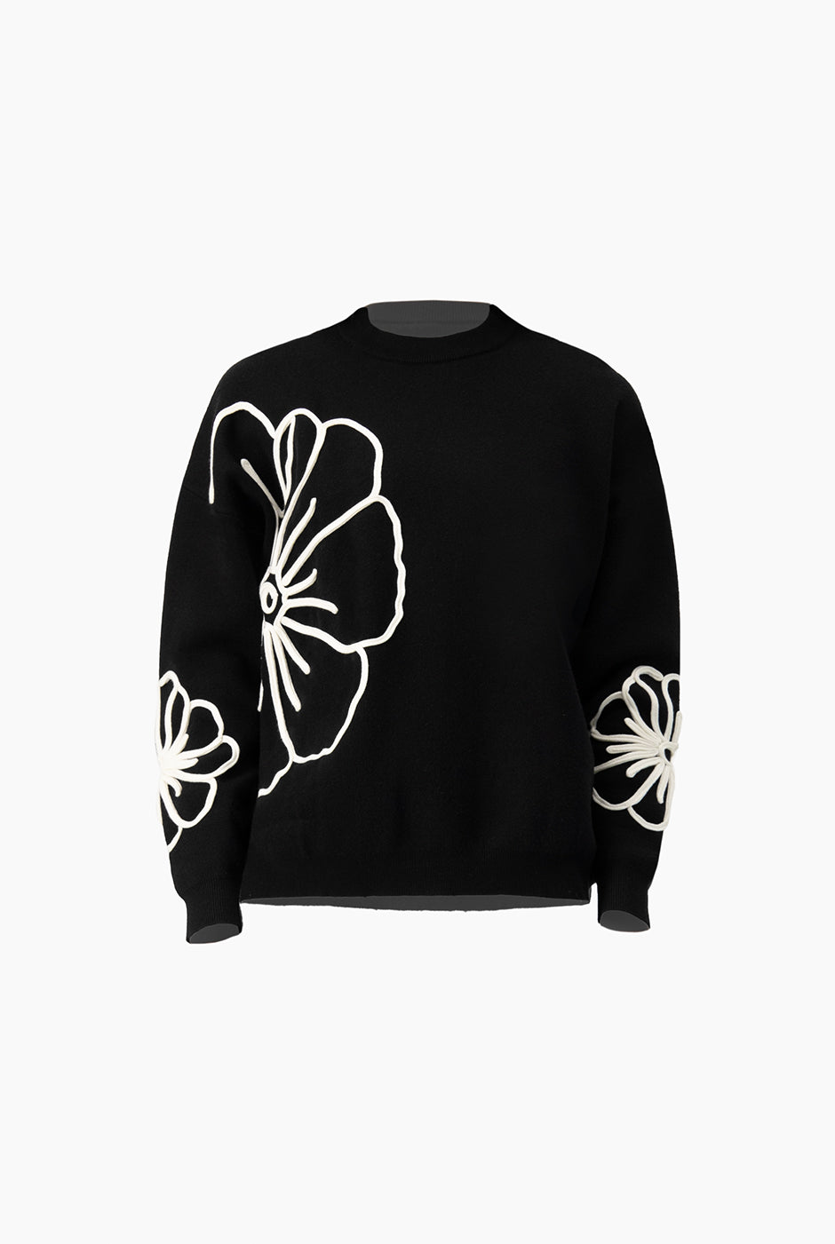 Pullover negro con cinta decorativa en contraste y estampado floral