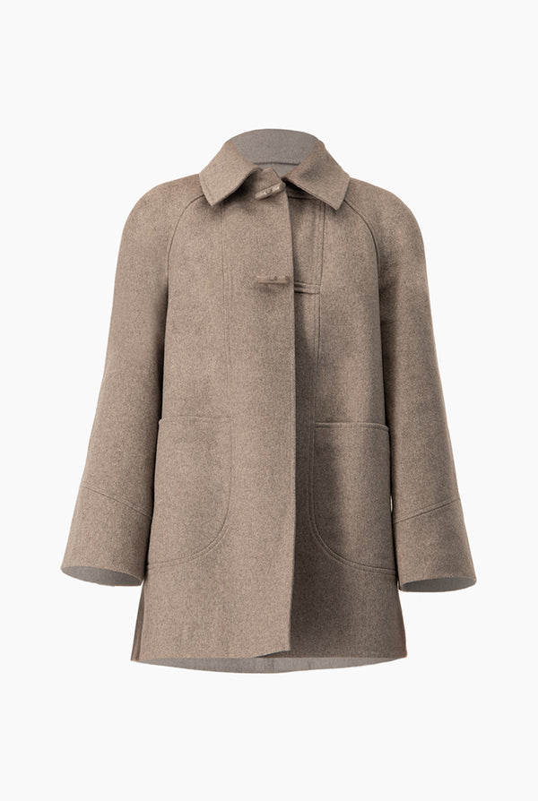 Abrigo gris con bolsillos