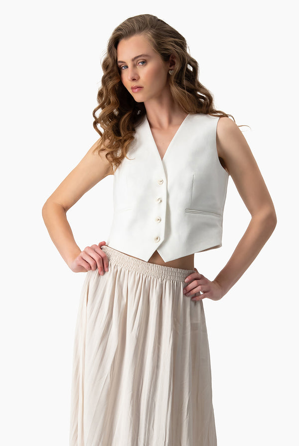 Chaleco marfil bolsillos simulados