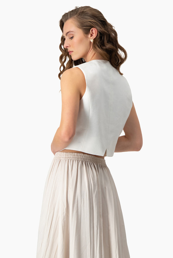 Chaleco marfil bolsillos simulados