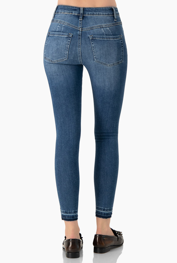 Jeans skinny de un boton frontal