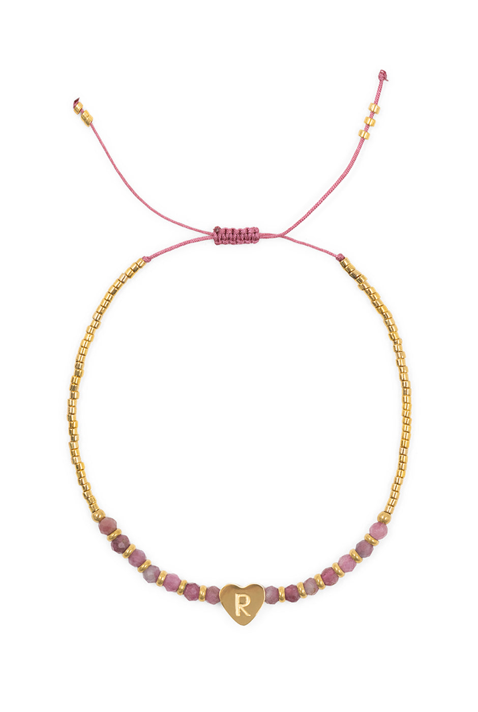 Pulsera ajustable de cuentas doradas y rosas con dije de corazón.