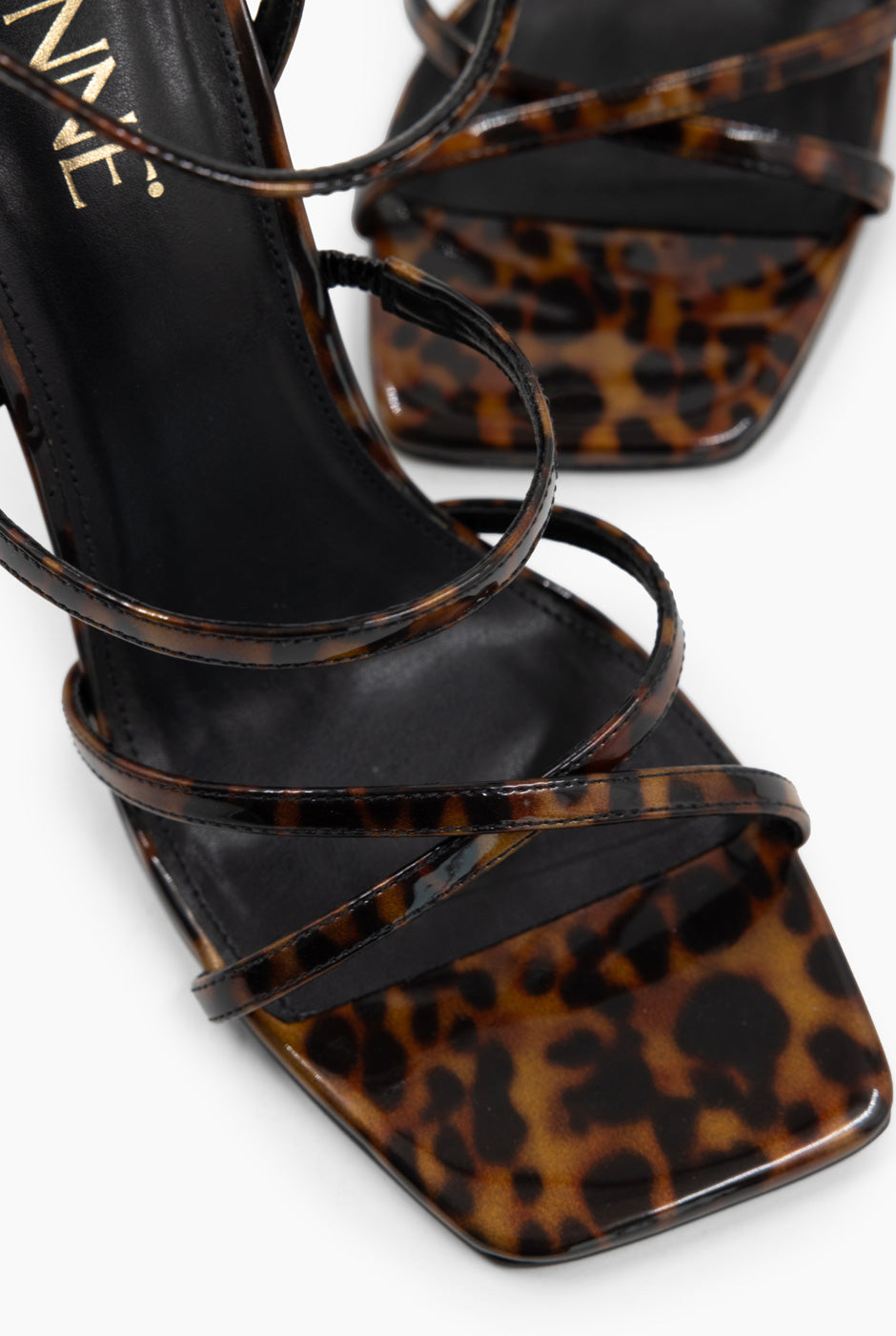 Sandalia Carey de cuero en estampado animal con tacón stiletto