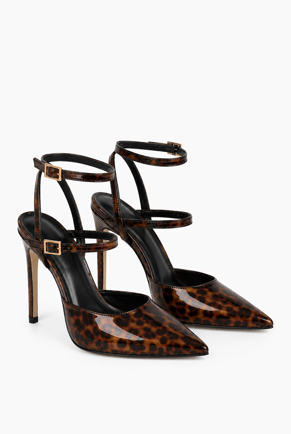 Zapatilla destalonada café con estampado carey y hebillas doradas