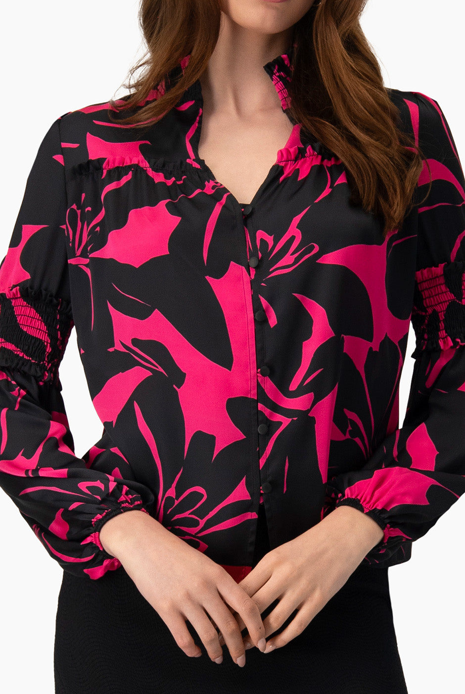 Blusa fucsia de manga larga con estampado floral y smock