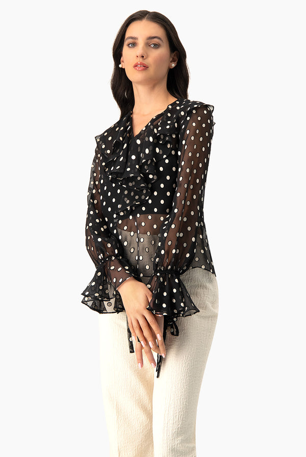 Blusa de lunares y escote en V