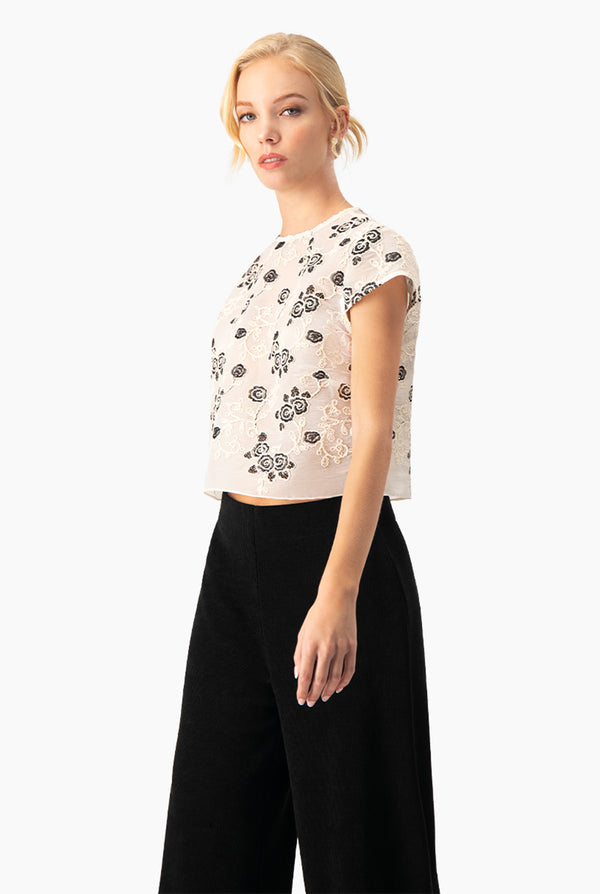 Blusa corta cuello redondo