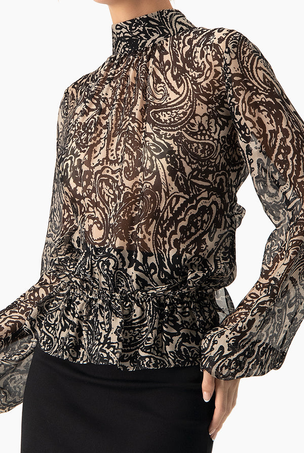 Blusa estampada cuello alto