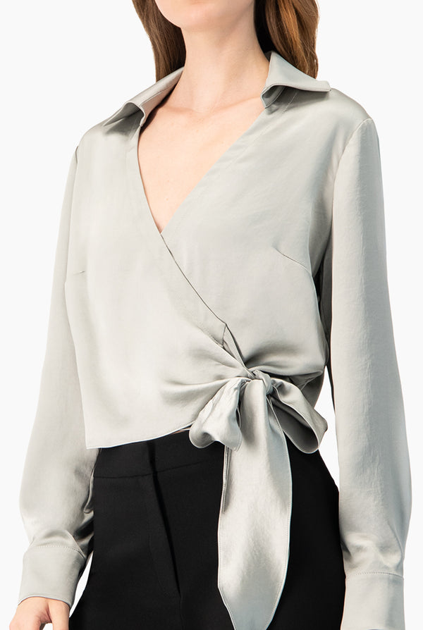 Blusa cruzada de manga larga