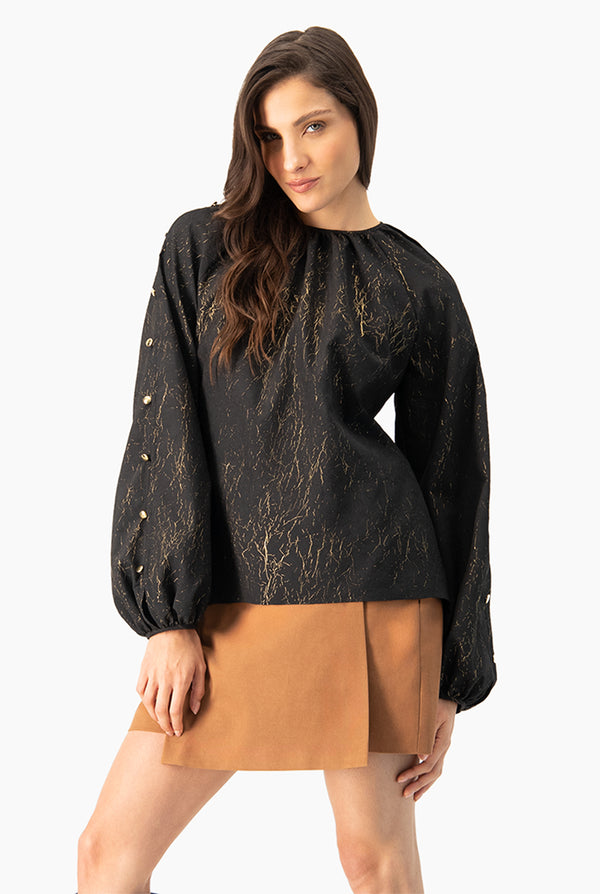 Blusa de manga larga amplia