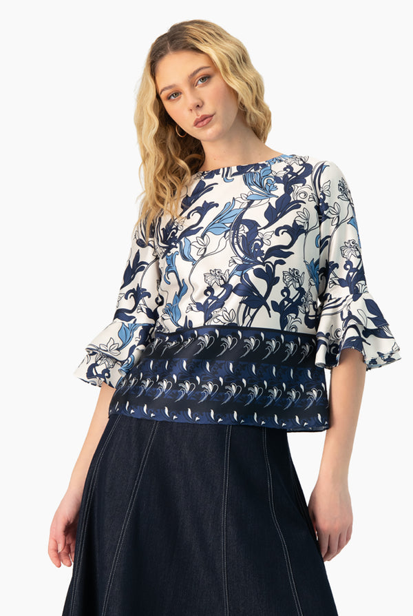 Blusa manga 3/4 con olanes