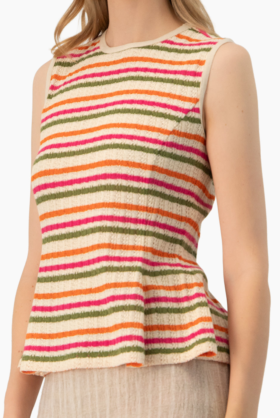 Blusa peplum multicolor sin mangas con rayas horizontales