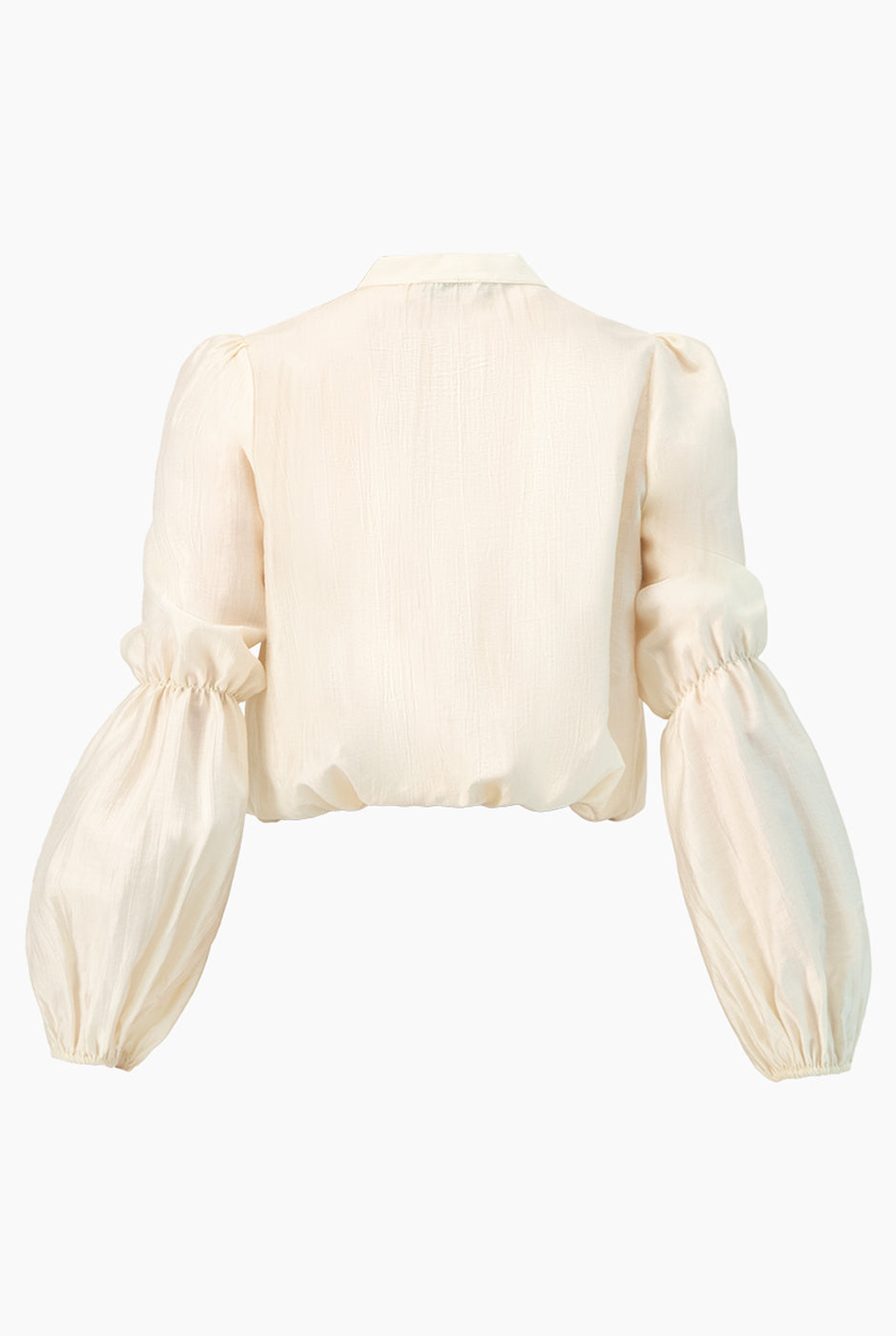 Blusa marfil con cinta en cuello y mangas largas
