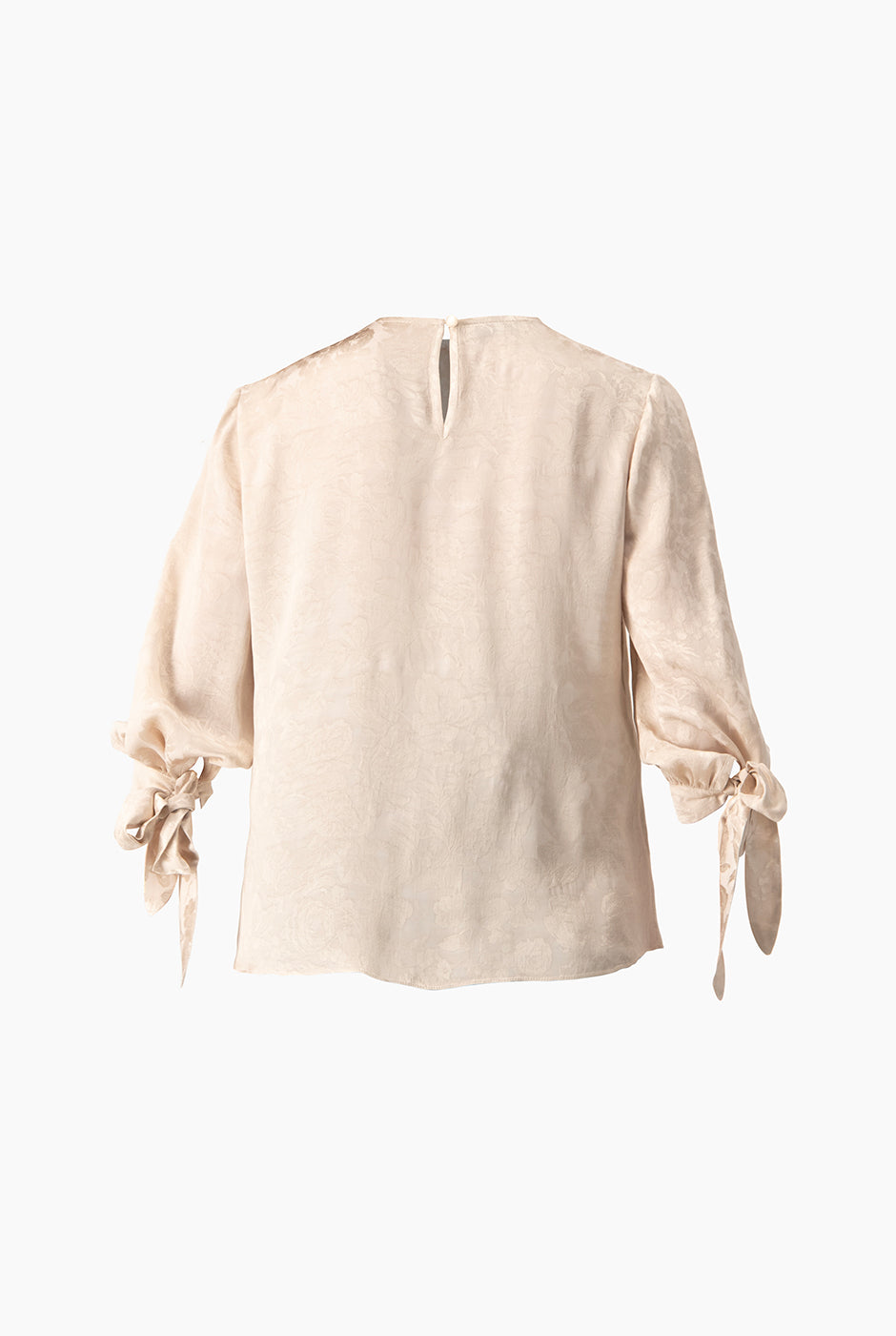Blusa beige recta con lazo en mangas y textura floral