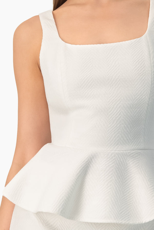 Blusa peplum sin mangas