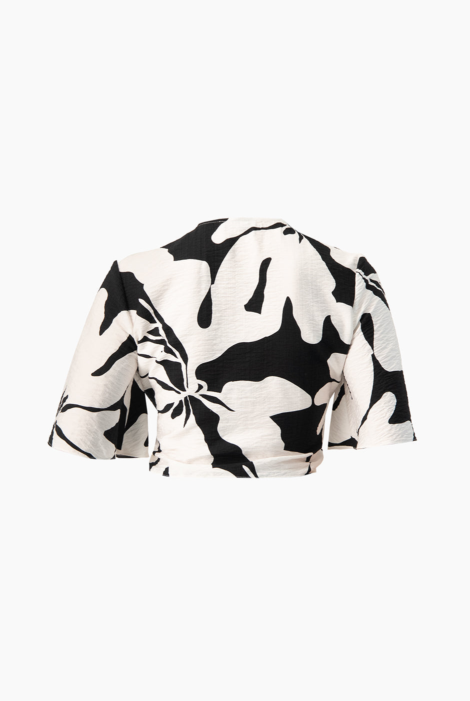 Blusa estampada de amarre en blanco y negro con nudo frontal