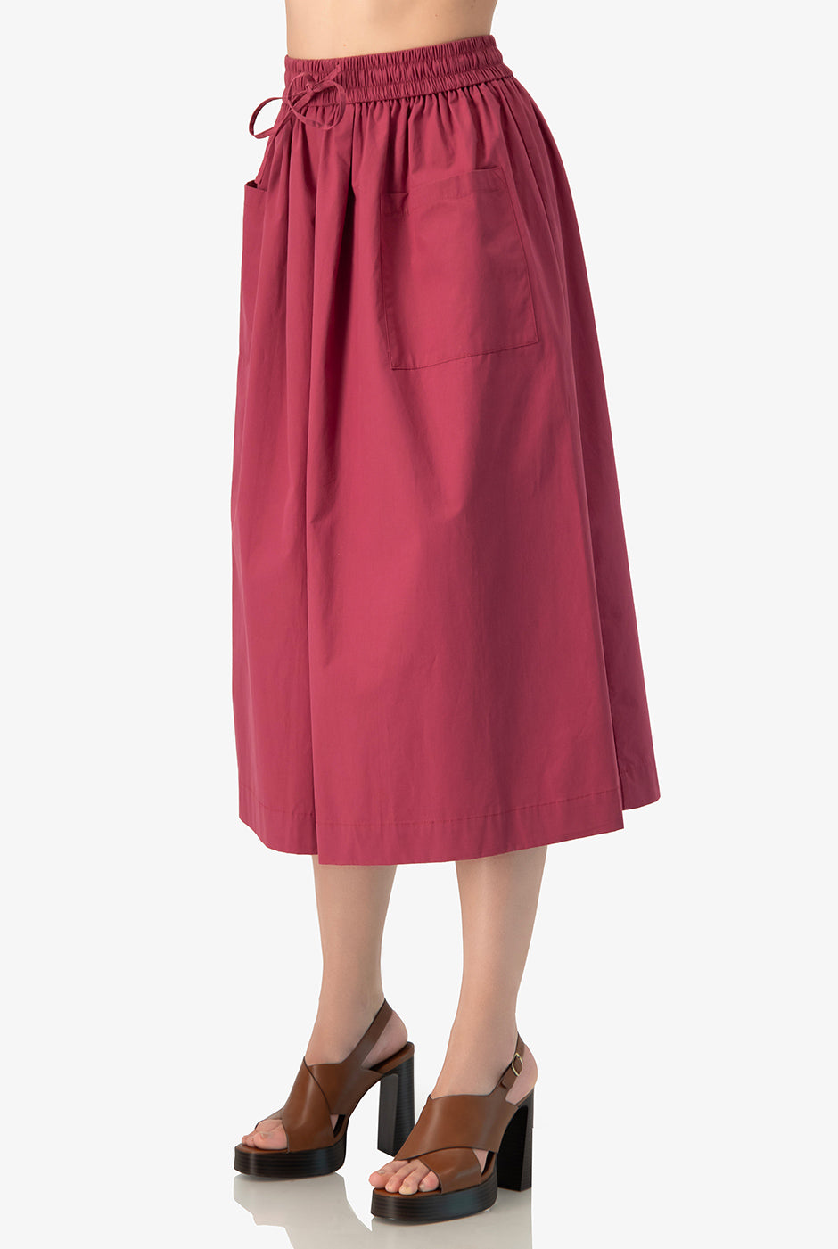 Falda midi rosa obscuro con bolsillos y cintura elástica