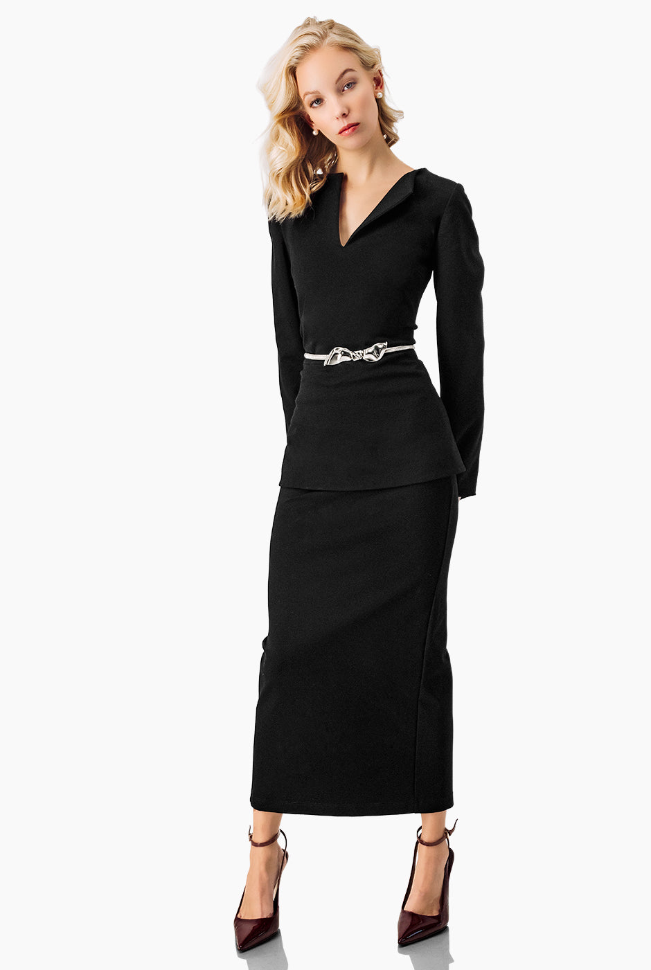 Falda midi negra ajustada con abertura trasera